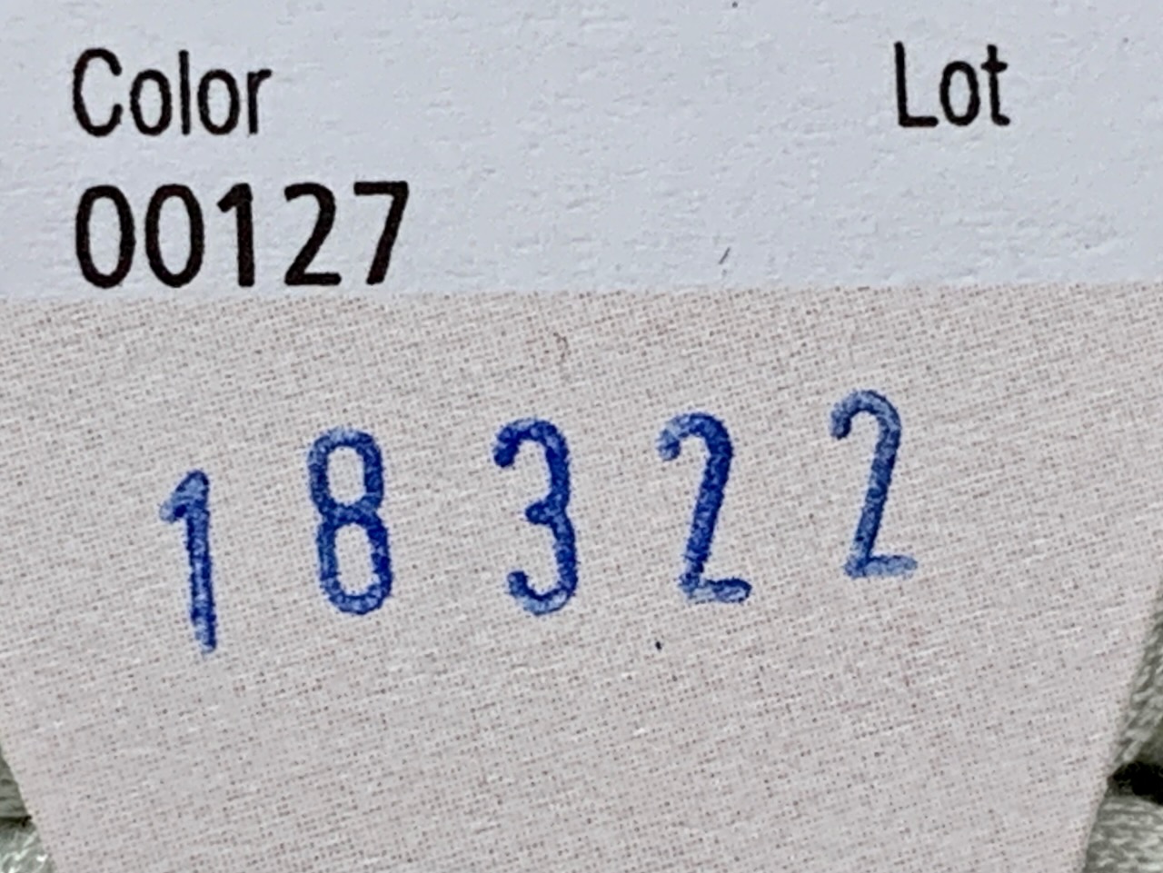 Die Garnbanderole - Farbnummer Partienummer